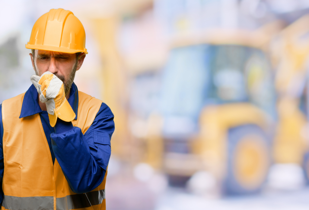 Construction worker coughing.