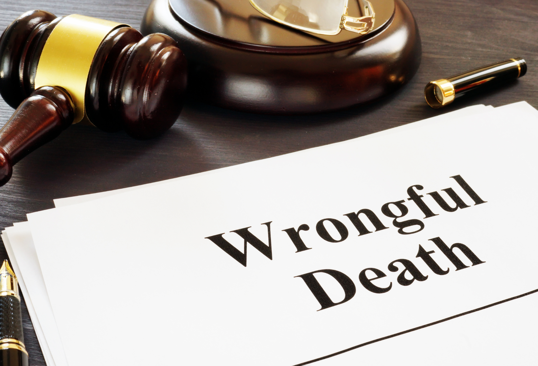 Court gavel and wrongful death paperwork.